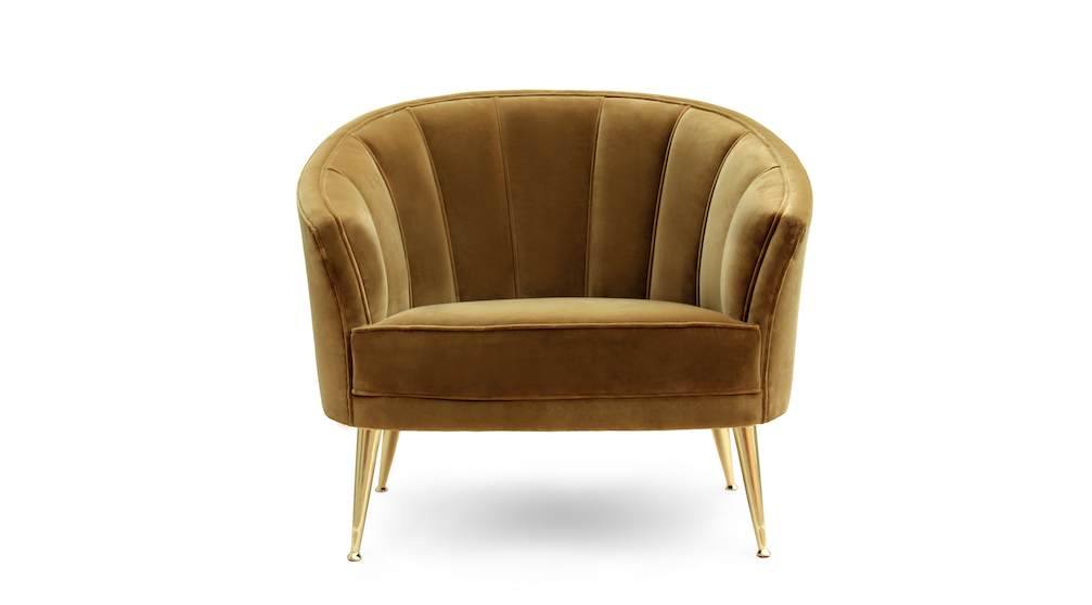 chartreuse velvet armchair with delicate gold legs against white background
