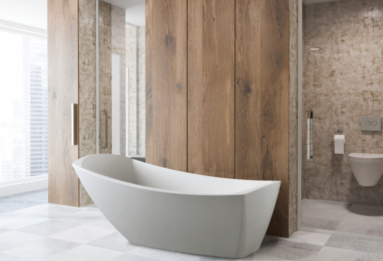 modern bathroom with wood siding and white slipper tub