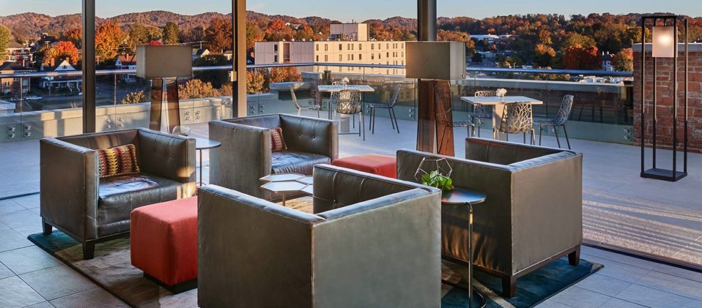 Bristol Hotel rooftop bar with view of mountains