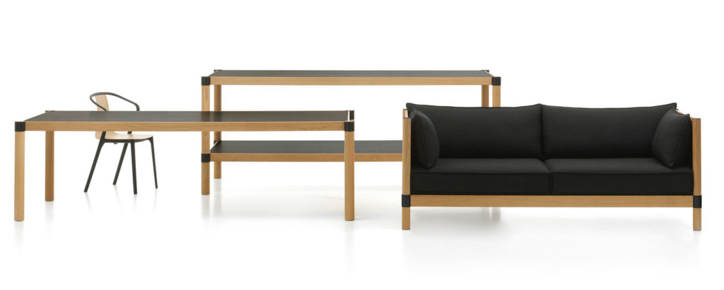 Vitra Cyl table, high table and sofa with dark veneers and black upholstery on sofa