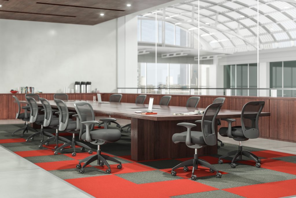 Many Nightingale MXO Chairs with gray upholstery around large conference table
