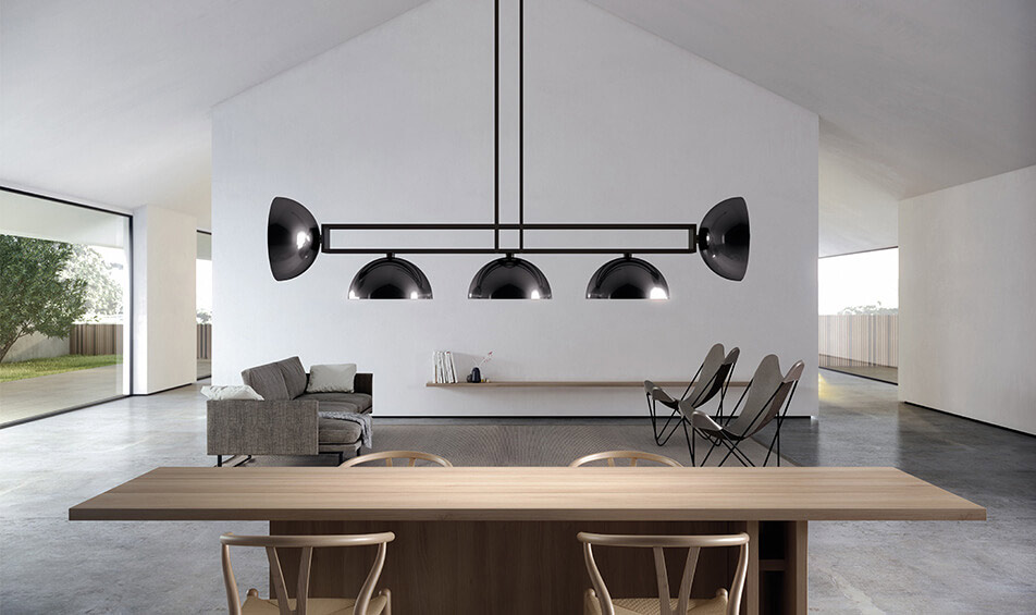 David Abad MK Horizontal Pendant in black in living room above wooden table