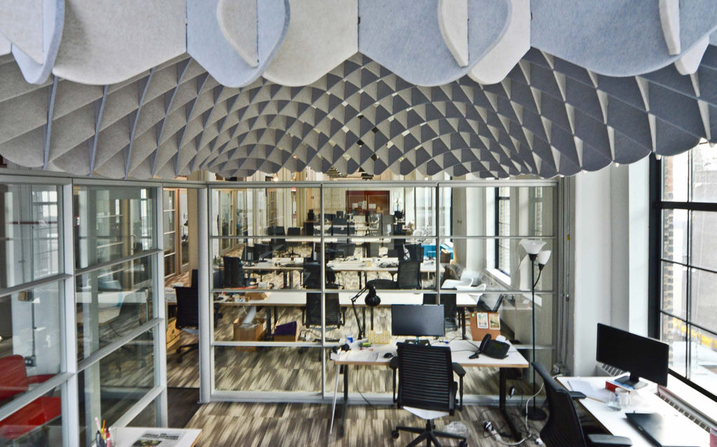 ezoBord Acoustical Net in white installed in ceiling of open office