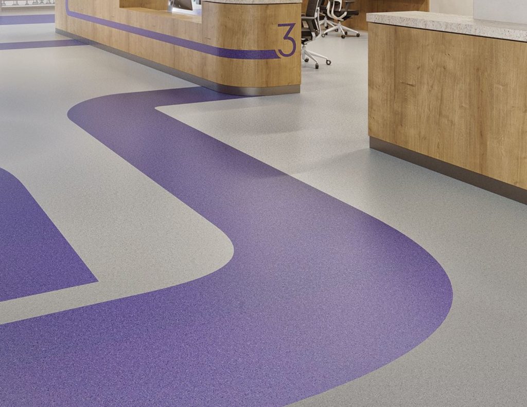 Mohawk Group True Hues Collection of rubber flooring gray and purple in curved pattern 