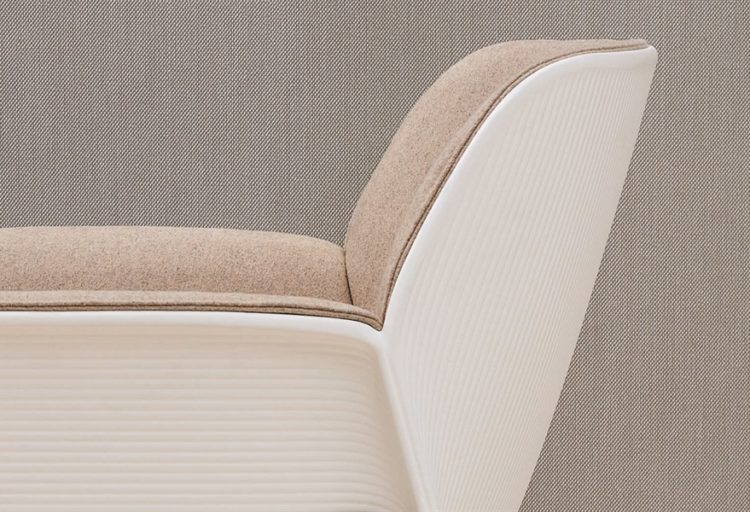 Andreu World Nuez Chair detail of contrasting hard exterior and soft interior with white shell and taupe upholstery