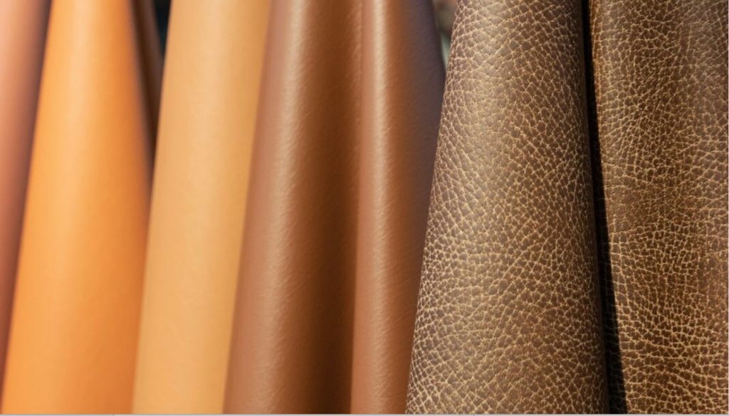 Ultrafabrics textiles at Helsinki Fashion Week close-up of fabrics tan, brown, chocolate