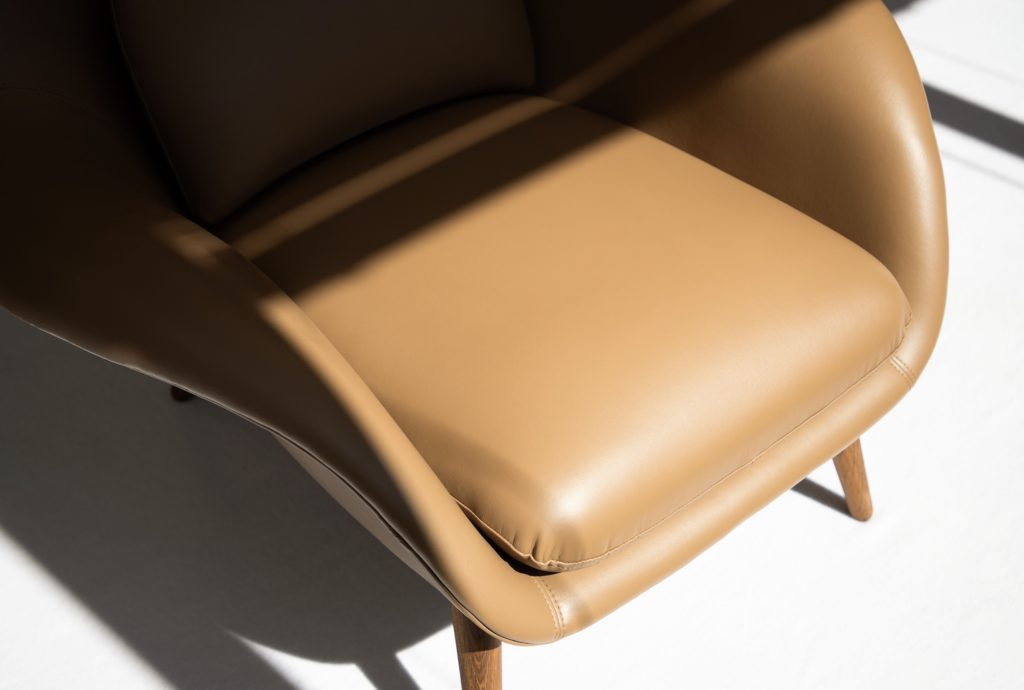 DesignTex Fredericia Chair beige partial view of seat and arms