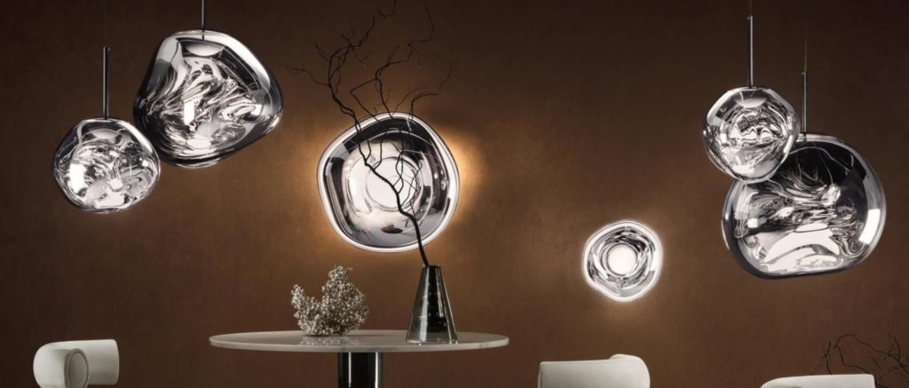 Tom Dixon Melt silver three wall lamps and three suspension lamps above cafe table