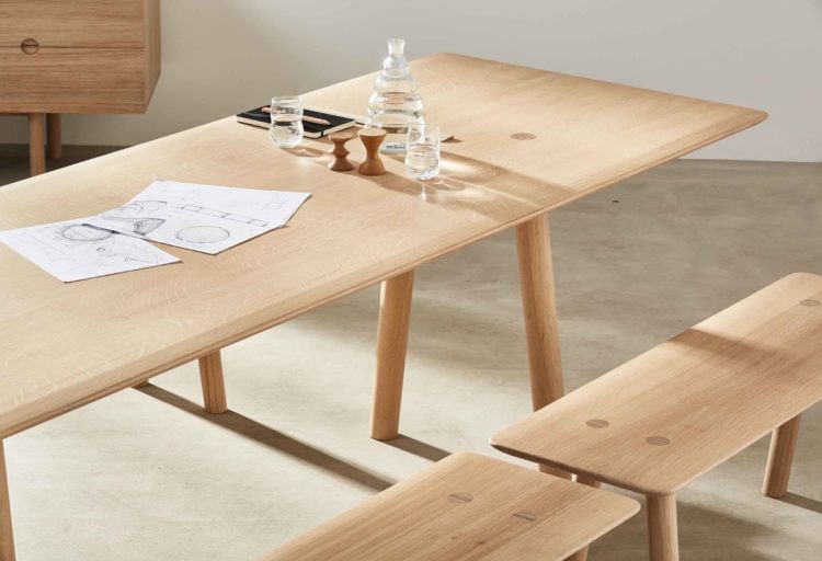 Benchmark Ovo Collection dining table with bench in light oak