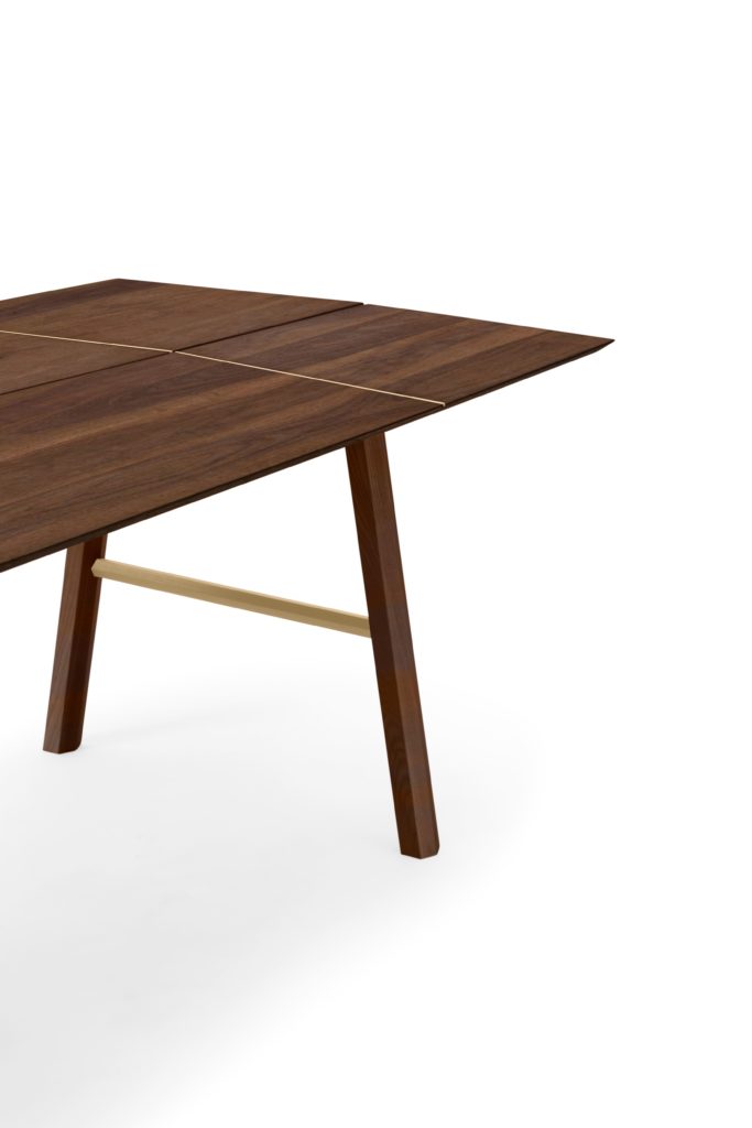 Woodendot's Savia Table dark-stained ash with gold highlights at table seams