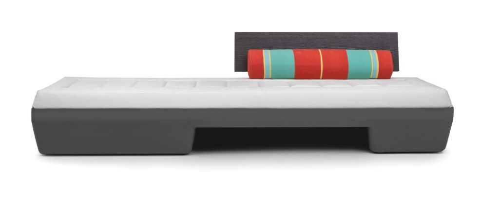 Benchmark contract Furniture Dune Collection sofa with gray base, white cushion, gray sideboard and colorful cushion