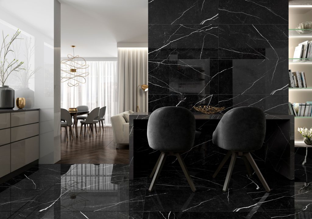 Tile of Spain 2020 designs Modernized Marble dark slabs with white veining on floor and accent wall of study