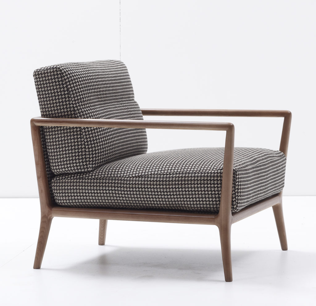 Carlton Armchair for Nube side view Houndstooth upholstery