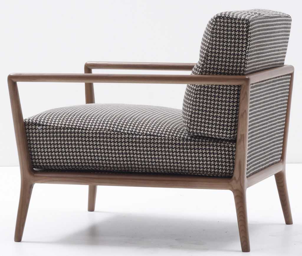 Carlton Armchair for Nube side view Houndstooth upholstery