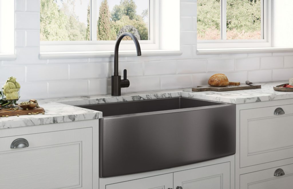 Ruvati's Terraza Sinks black medium view in kitchen with white and grey countertop and white cabinets