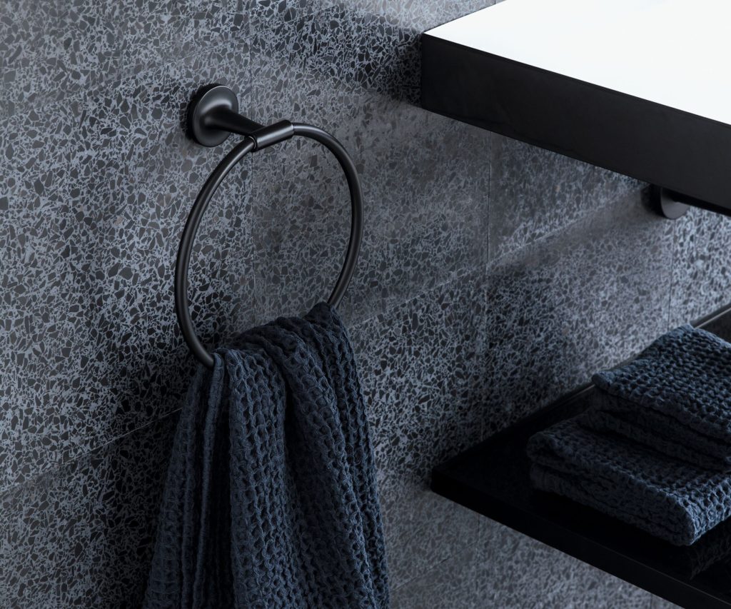 Duravit Matte Black products towel ring close up against granite wall