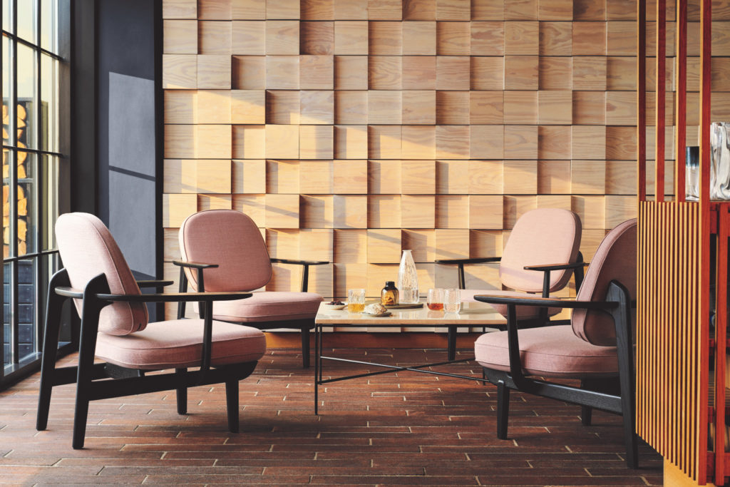 Fritz Hansen Fred Chair in pink upholstery four chairs around low cafe table