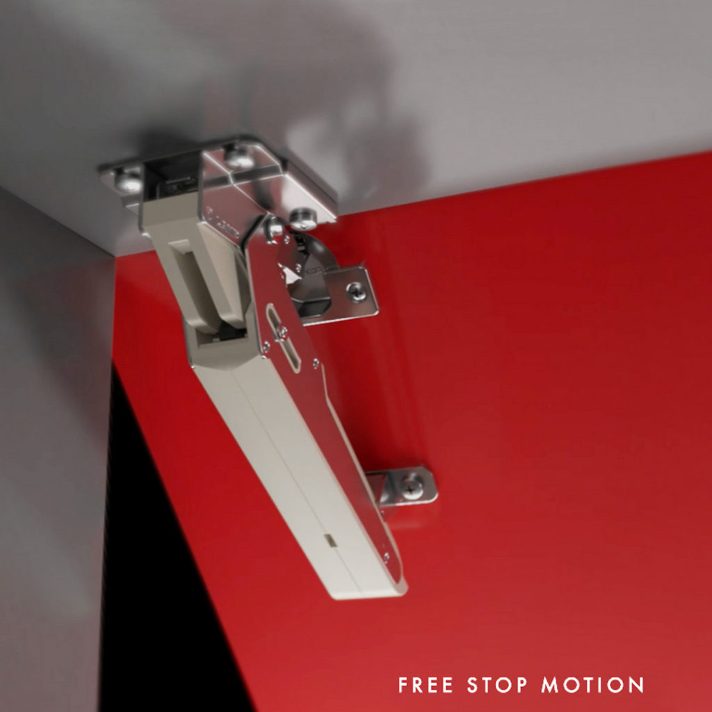 Aileron Lid Stay Hinge System interior view of gray cabinet with red door partially open demonstrating Free Stop Motion function
