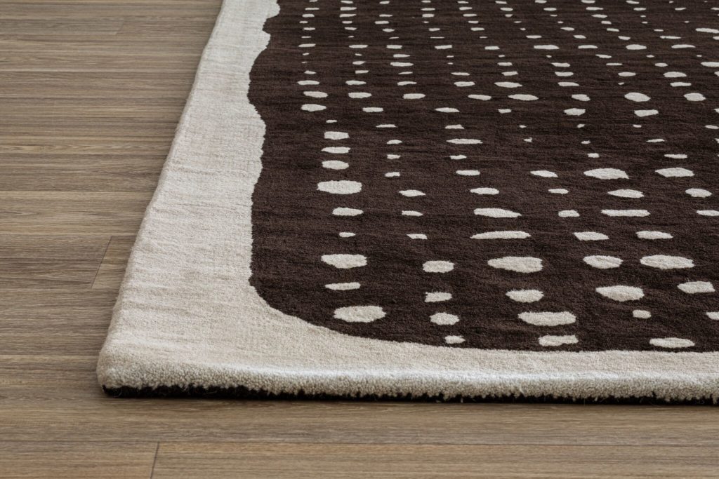 Nanimarquina Collection for Coalesse Basket close up black rug with white border and white dots