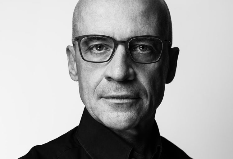 Claudio Bellini black and white image wearing black turtleneck