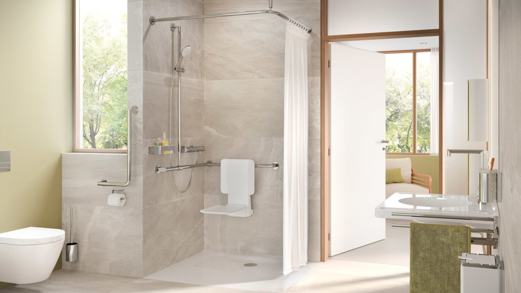 Hewi System 900 shower seat and support rails in large open bathroom