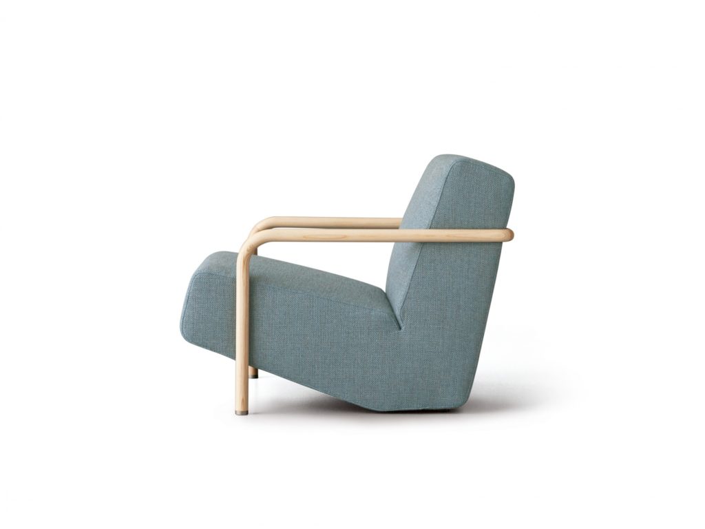 Porro Lullaby Armchair side view blue/green upholstery with natural wood arms/legs