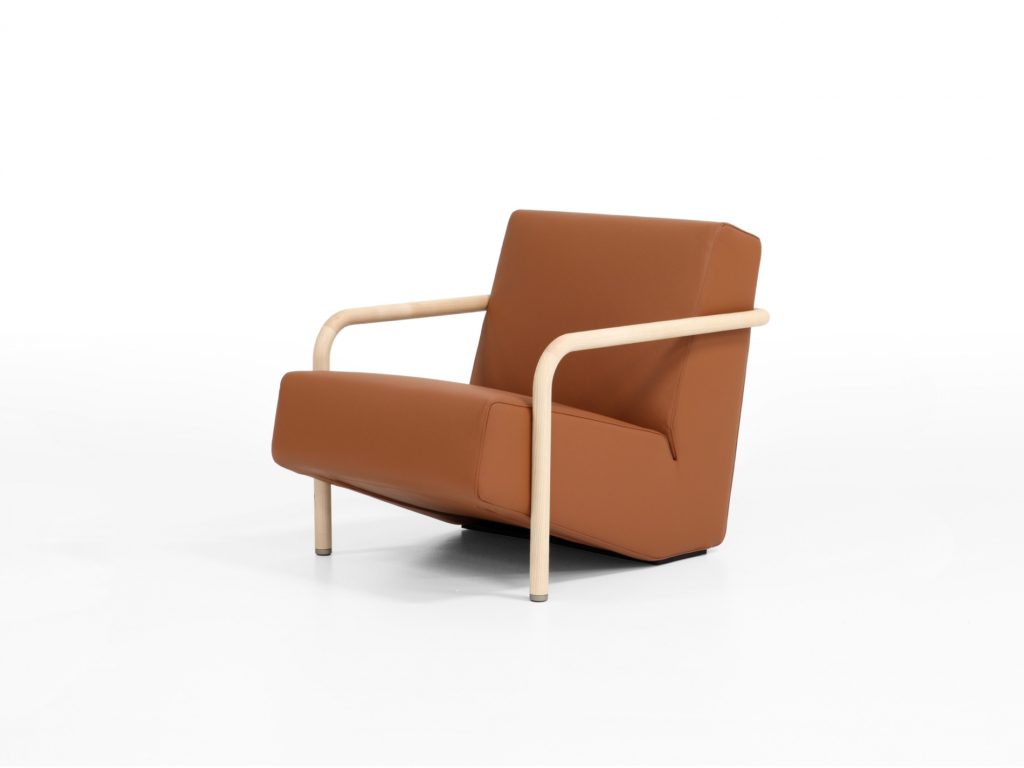 Porro Lullaby Armchair front view rust upholstery with natural wood arms/legs