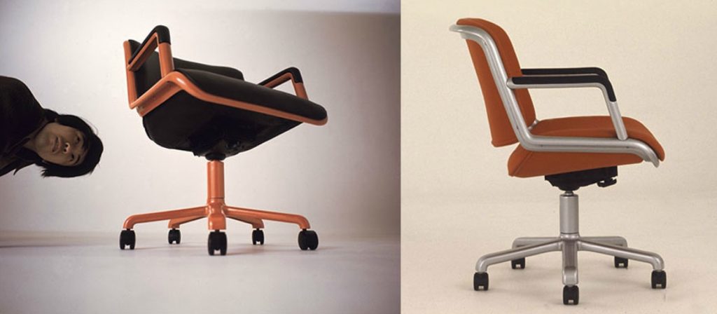 Douglas Ball CAS Chair split image of two chairs: on the lift in black with orange frame and man's head held sideways; on right in orange with silver frame 