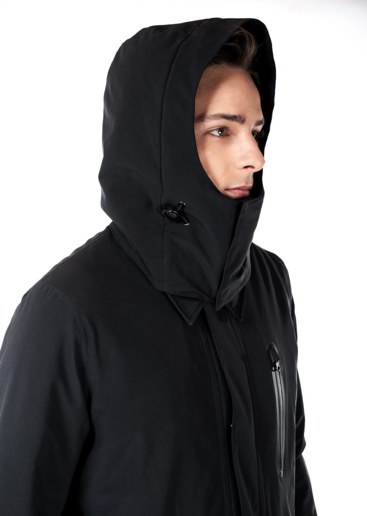 Ultra Coat on male model shot from waist up wearing hood