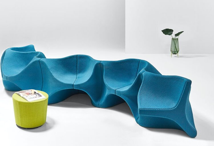 Unika Vaev's Bond Street Collection Zoom fabric on space-age sofa in aqua blue