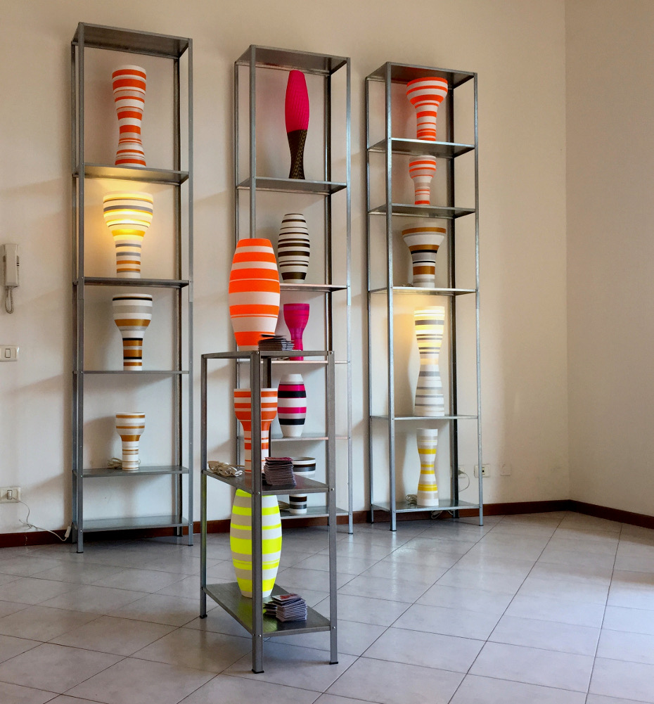 Michiel van der Kley Bob's Your Uncle lamp many lamps in different colors displayed on open shelving