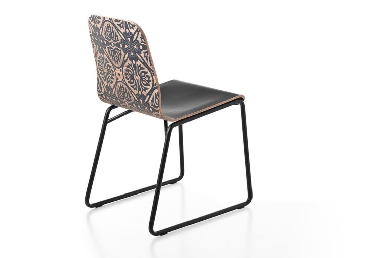 DVO Tattoo Chair black wood with intricate design on back