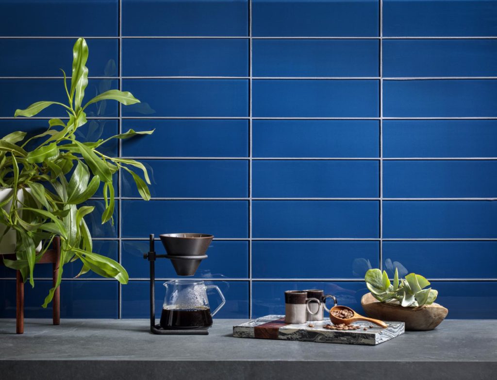 Smart Surfaces Island Stone rectangular tiles in deep blue in kitchen