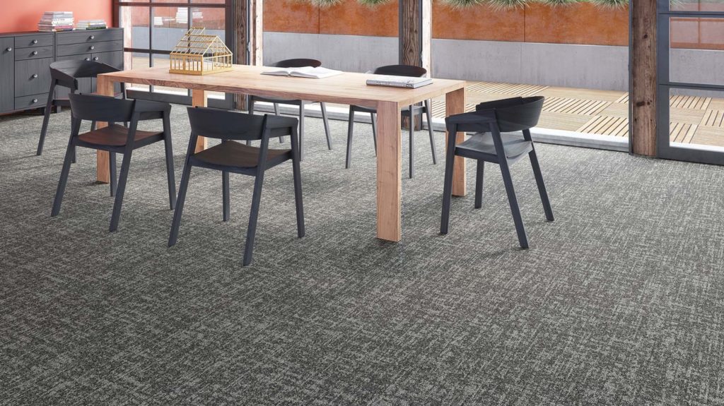 Patcraft Crafted Surface gray in open room with work table