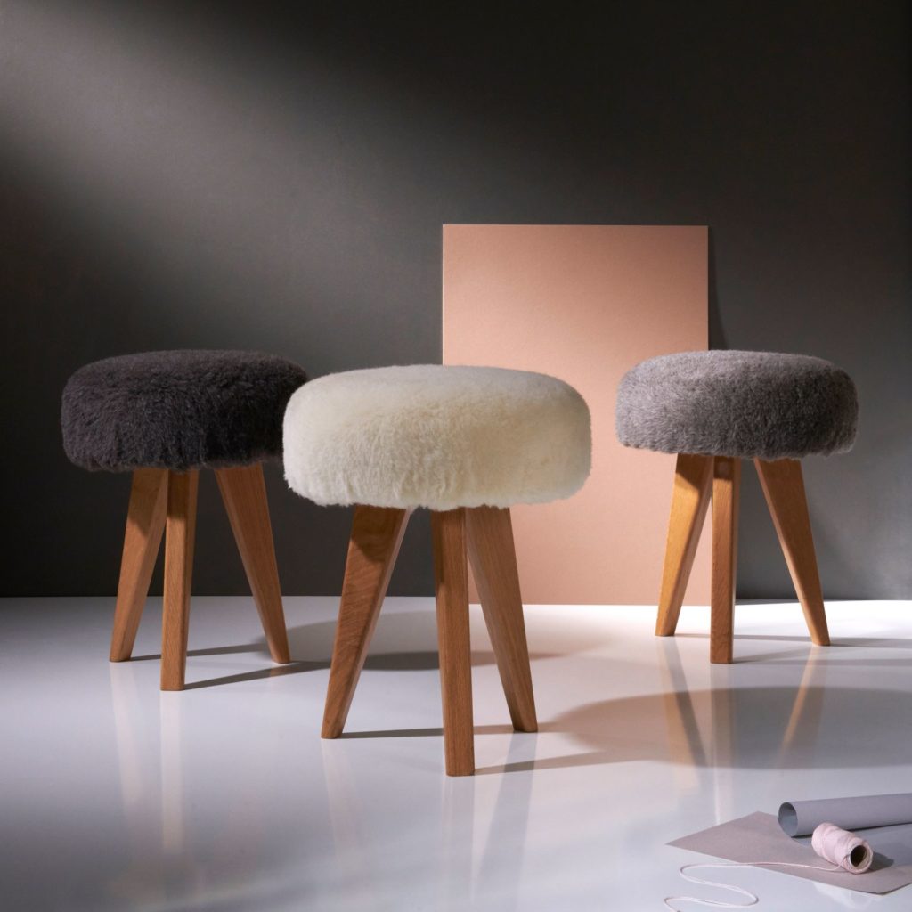 new textiles from Camira Dolly on stools three colors