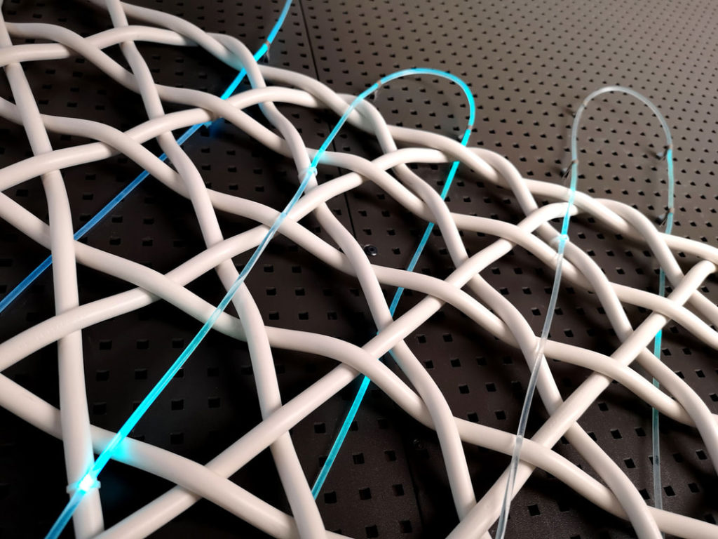 Mantzalin's Architectural Lace fiber optic cable interwoven