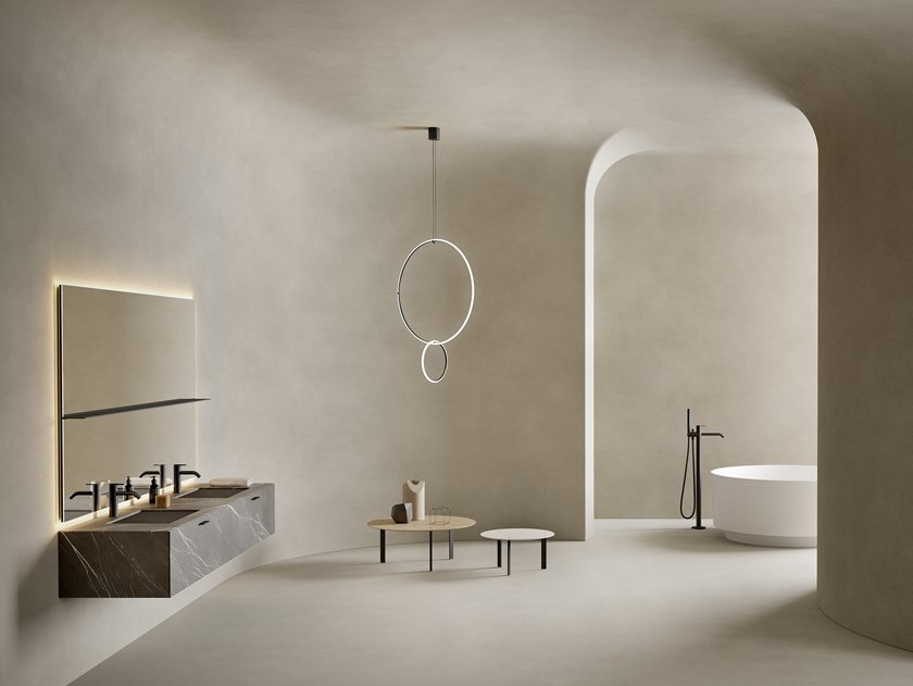 Inbani Arc Collection spacious bathroom with partial view of circular arc tub