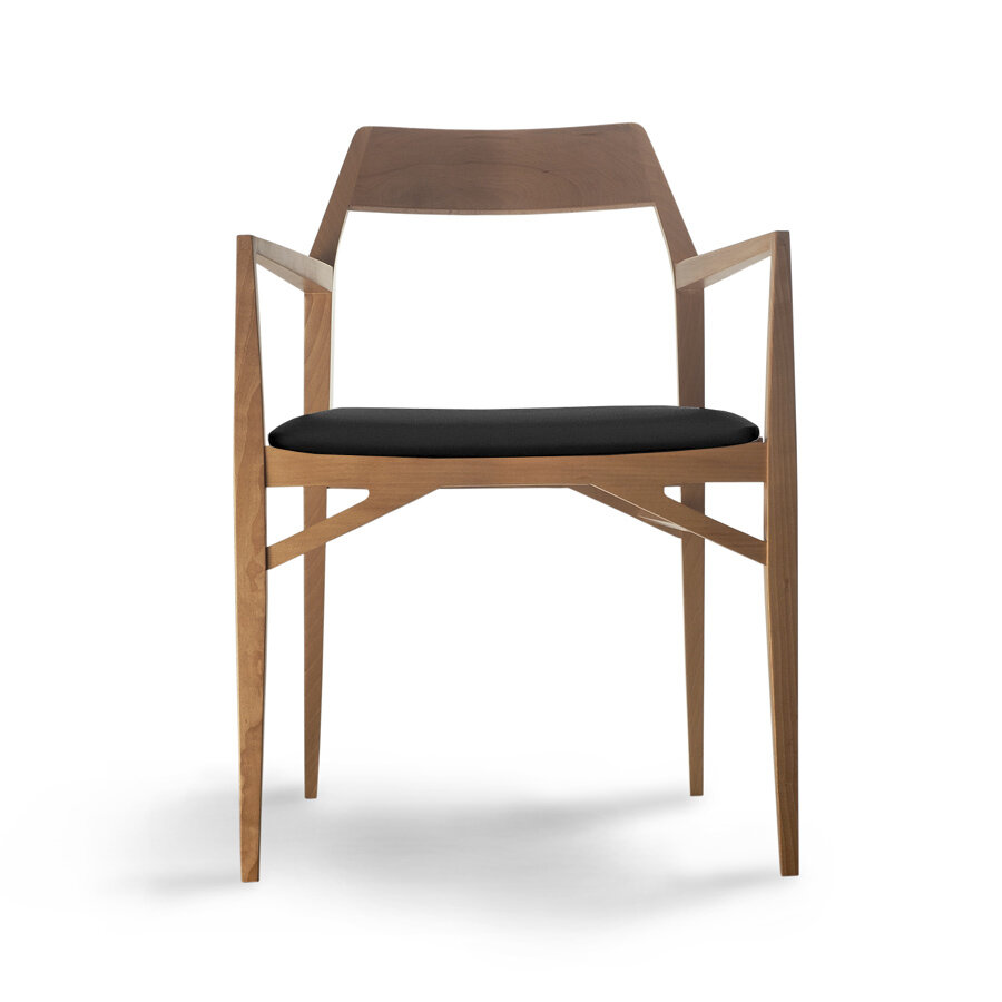 Aya chair front view in walnut with black leather seat