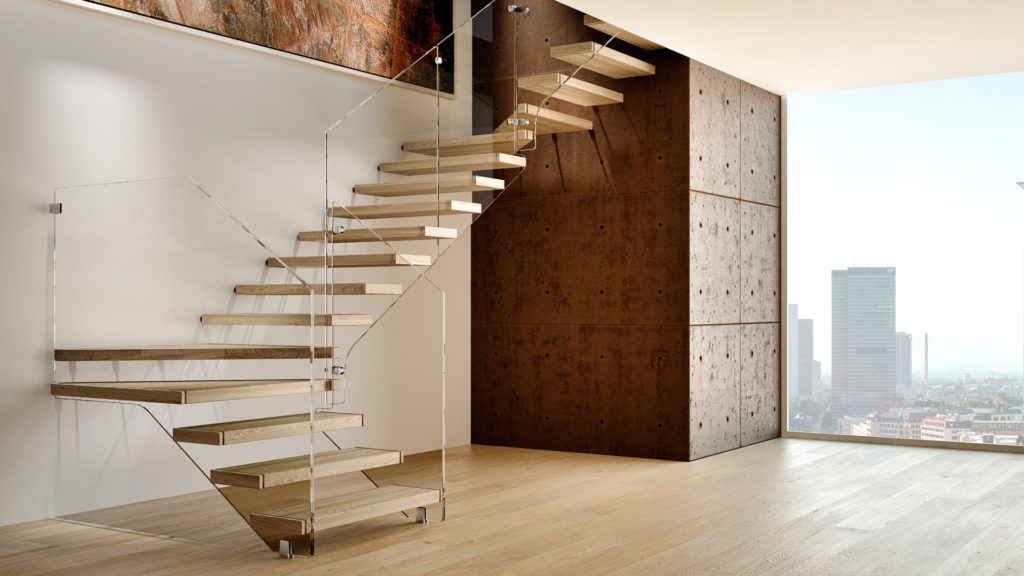Staircase with wooden treads and glass panel style railing in large apartment with city view