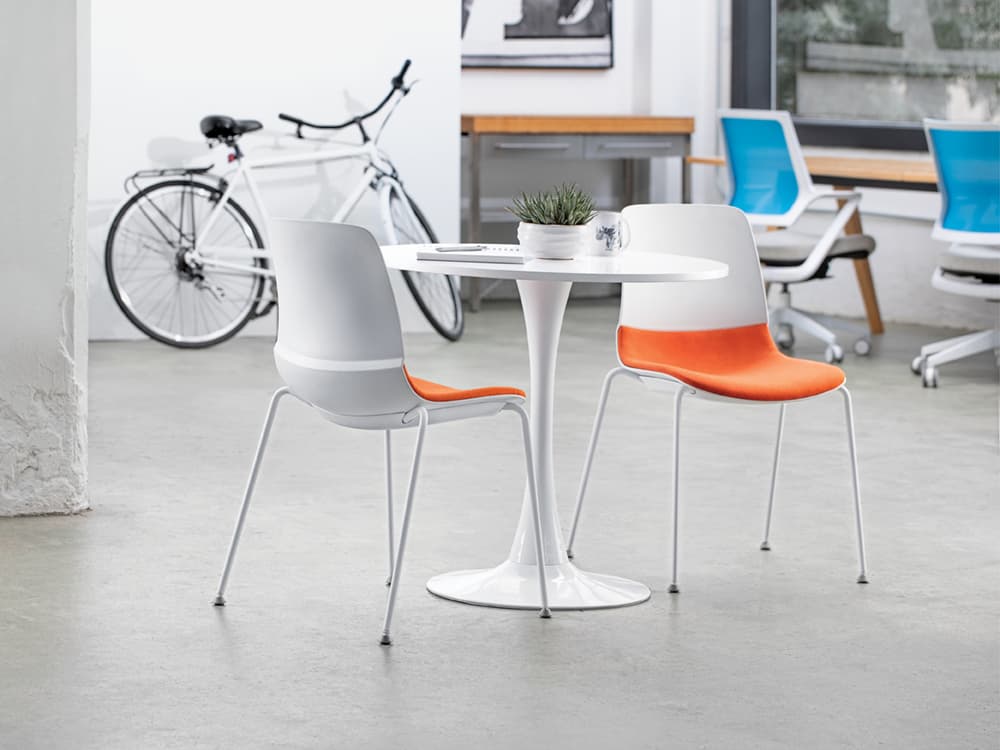 Mika Multi-Purpose chair two chairs in white with orange upholstery