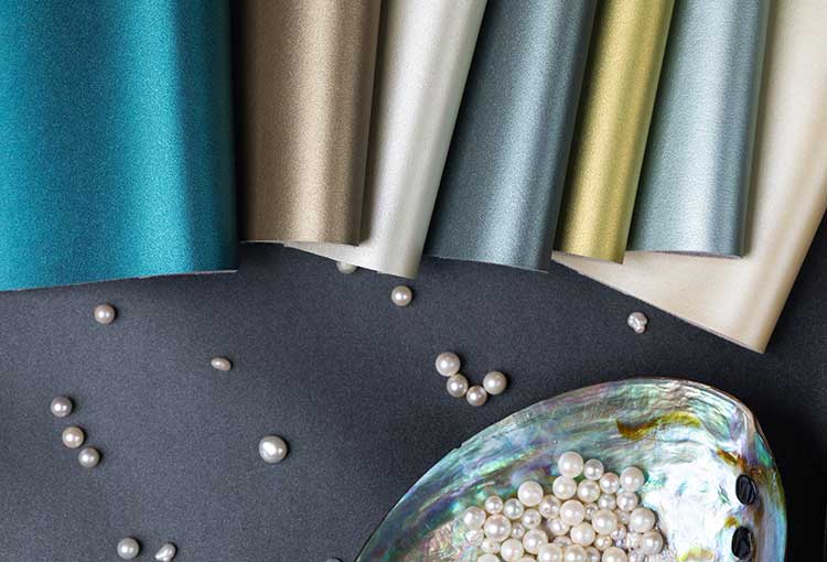 Architex Summer Textiles Pearlescent swatches with pearls and oyster shell