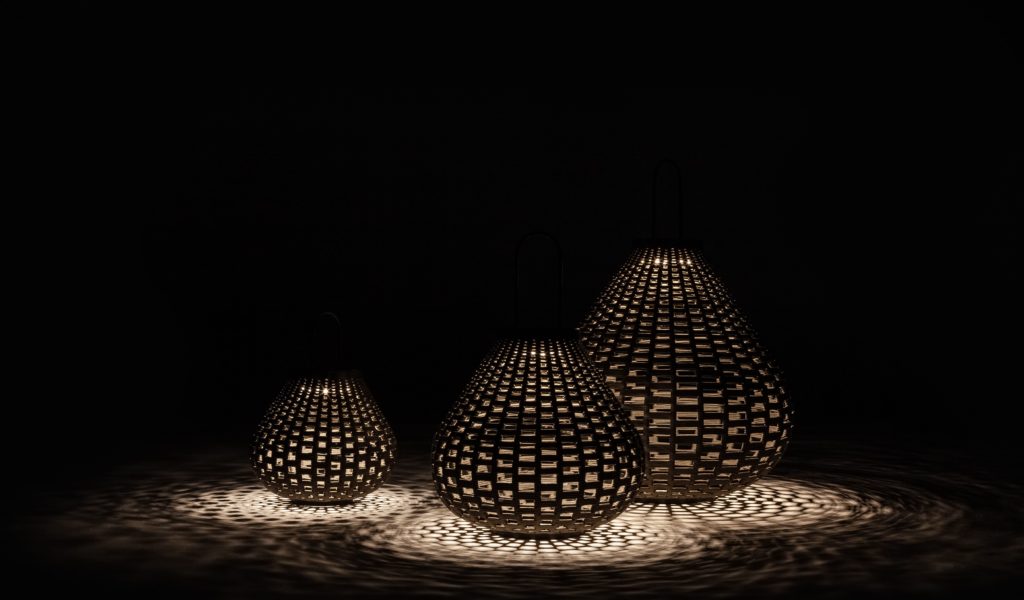 Boundless Living Sparkler lamp shaped like an avocado with perforated metal and lights shining through