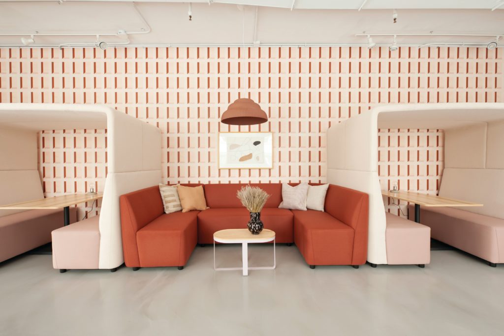 Hightower's permanent showroom at the Merchandise Mart with Four Likes Privacy Booths and couch