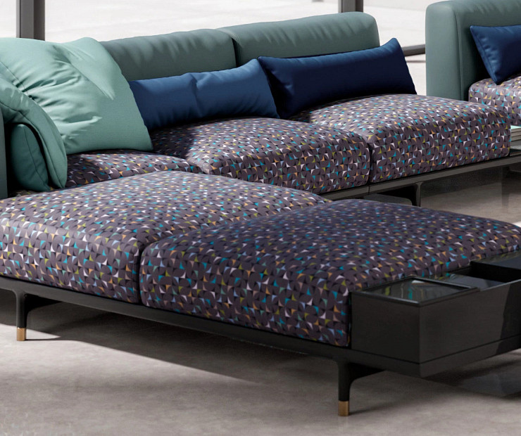 Techne Collection Shift textile of different kite-like shapes in many colors on purple background on modular sofa