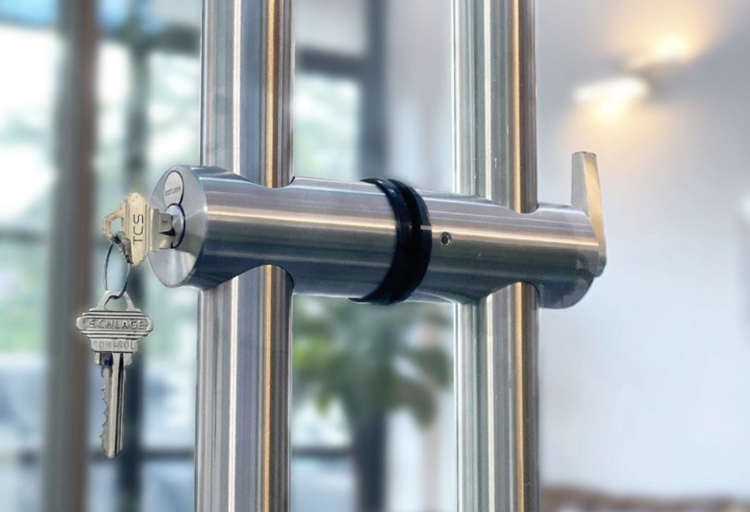 Detail of door handle with ADA compliant locking mechanism