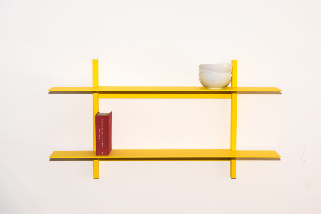 Util Plié wall shelves two shelves in yellow with cups and book