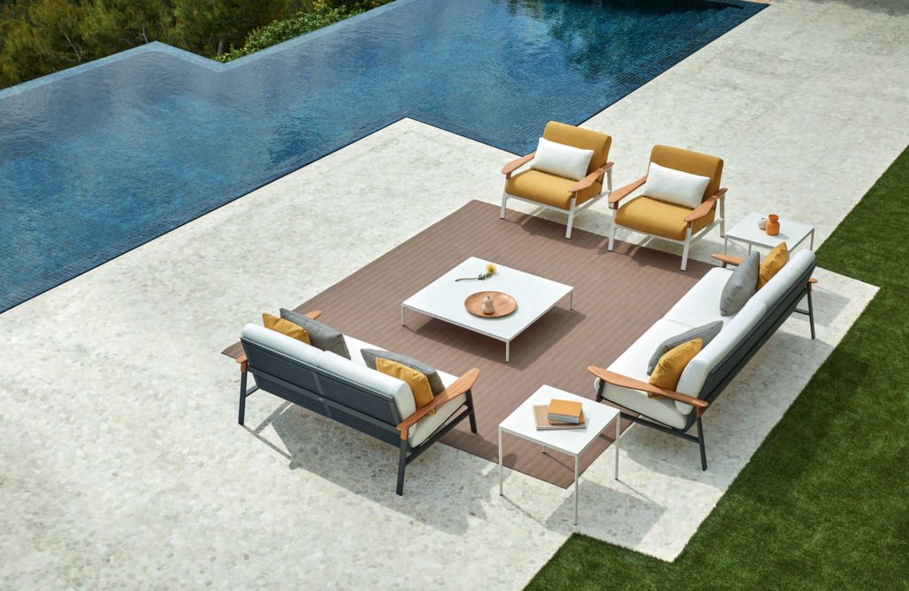 Point City Collection overhead view of sofas, chairs, and tables near linear pool