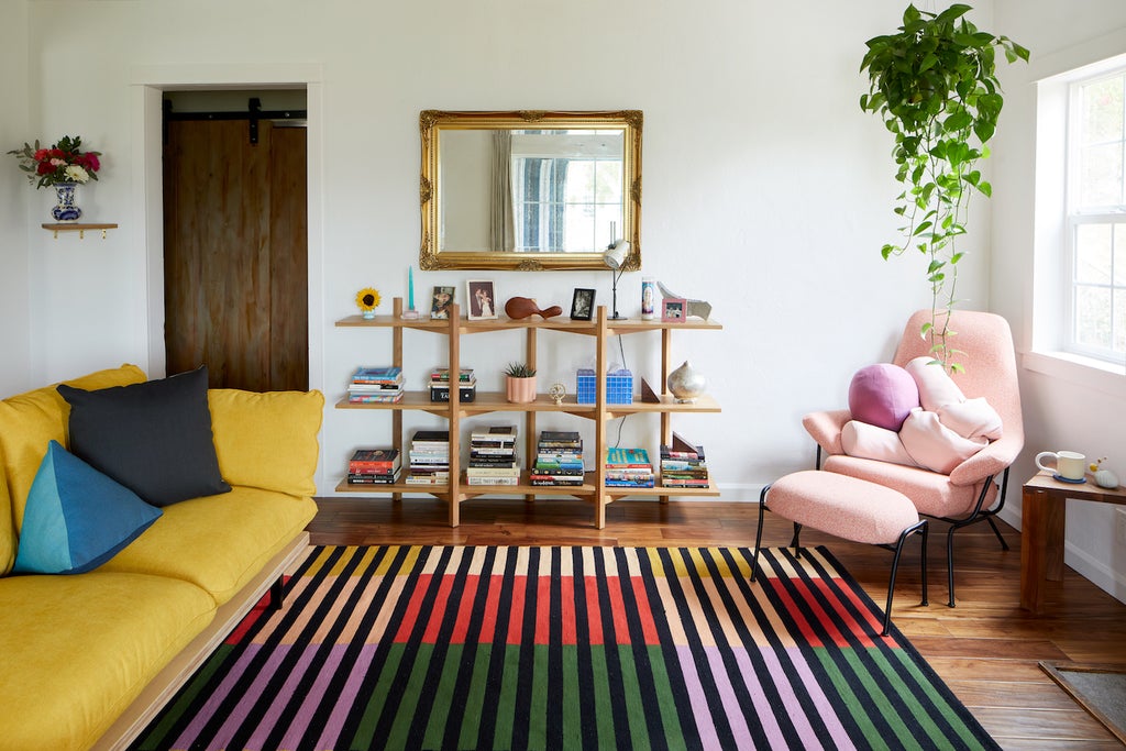 living room with Wild Cherry area rug by Jessica Poundstone