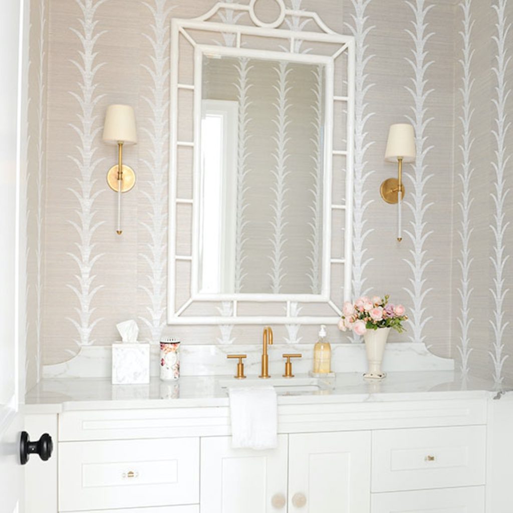 Acanthus Stripe style with a pointy pattern like a desert plant against taupe background. In bathroom. 