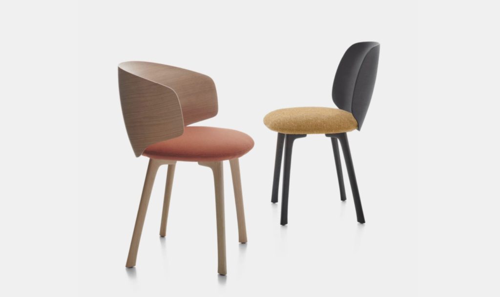 Two chairs with wooden legs and different upholstery/backrest combinations